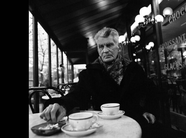 Samuel Beckett photographed in Paris Cafe on Boulevard St. Jacque, December 1985, by John Minihan