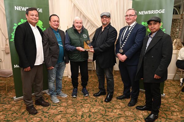 Most Entertaining Group, the Fillipino Community. Presentation by Mick Donohue and cllr Noel Heavey