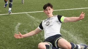 <p>Rhys Jones celebrates one of his goals against Waterford</p>