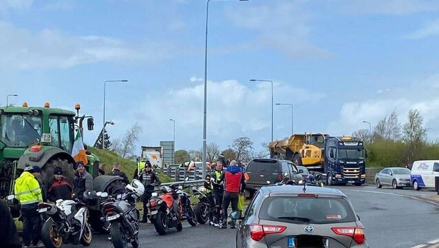 <p>Fuel protestors off junction 3 on the M9 at Mullamast on Sunday</p>