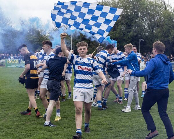 Athy's centre Darragh Farrell celebrates last year's Towns Cup Final win over Carlow Photo: Tom Nolan