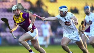 <p>Dan O'Meara tries to get a tackle in on Wexford’s Jack Redmond when the two counties met in the final round of the league last month Photo: ©INPHO</p>