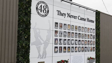 Families of Stardust victims take part in slow walk to Coroner's Court