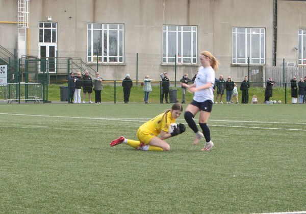 Waterford keeper saves bravely at the feet of Teegan Lynch