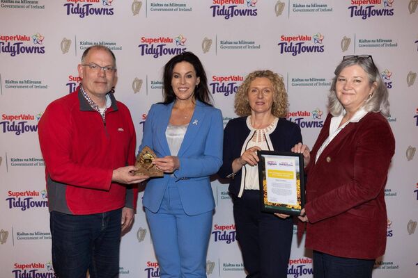 Gold Medal presented by Minister Carroll MacNeill &amp; Edel Clancy, Corporate Affairs Director at Musgraves to Padraig McEvoy of Clane Tidy Towns with Marian Higgins, Kildare County Council 