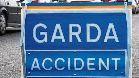 Truck overturns at motorway roundabout