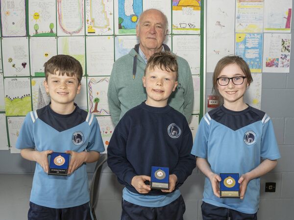Room 11 winners - 3rd Adam O'Brien, 2nd Alfie Higginson, 1st Aida Redmond with John MacKenna.