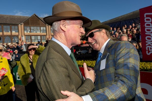 Willie Mullins and owner Rich Ricci celebrate winning the Ladbrokes Punchestown Gold Cup with Gaelic Warrior