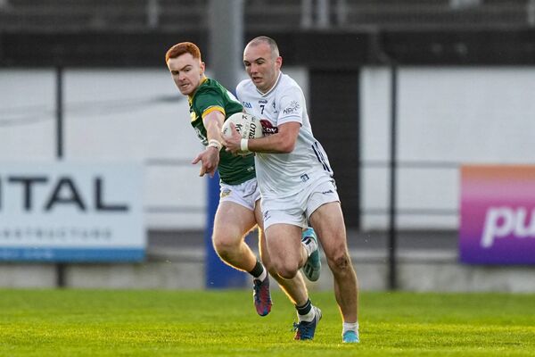 Ben Ryan carries the ball forward for Kildare in typically swashbuckling style Photo: James Lawlor