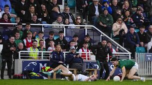 <p>The looks on the faces in the crowd behind say it all about the impact of Ben Ryan's tackle on Meath's John Harkin Photo: James Lawlor</p>