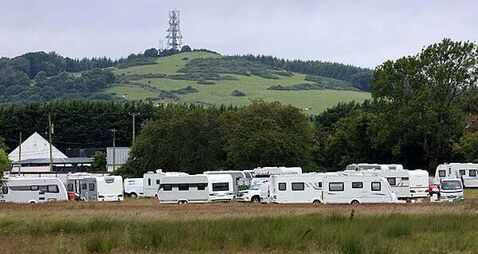 Most caravans parked around Curragh have left, court hears