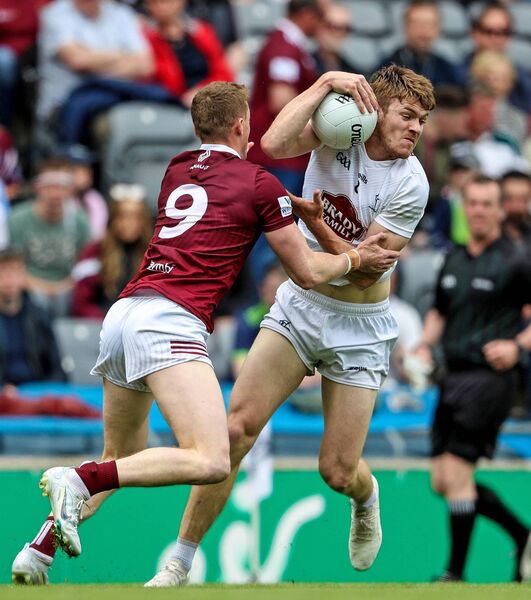 Two key men for their respective teams, Kildare's Kevin Feely and Westmeath's Ray Connellan tangle during the 2022 Leinster semi-final Photo: ©INPHO/Laszlo Geczo 