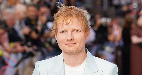 Ed Sheeran sings hit song with Ipswich players after promotion to Premier League