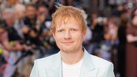 Ed Sheeran sings hit song with Ipswich players after promotion to Premier League