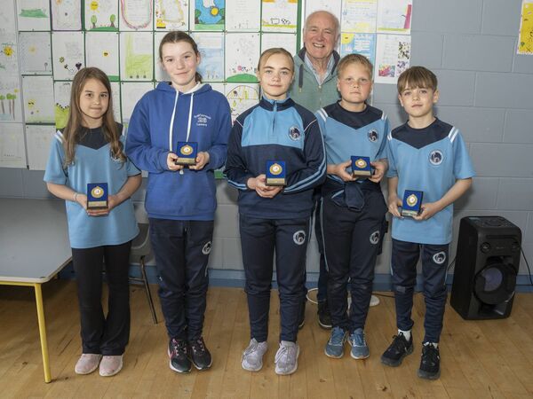 Gaeilge Awards - Veronica Ruthowska, Chloe Cogan, Nikola Jastrzebska, Ivan Tarvies and Evan Dunne with John MacKenna