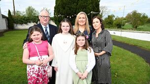 <p>Emma Louise McGannon and family at the Church of the Sacred Heart<br>	Photos: Jimmy Fullam</p>