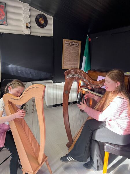 Student Ciara Keenaghan enjoying her harp lesson with Margaret Lawler. Student Ciara Keenaghan enjoying her harp lesson with Margaret Lawler.
