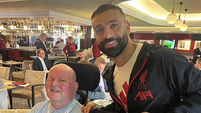 Seán Cox presents GAA jersey to Mo Salah