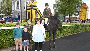 <p>Children enjoying Army Equitation School Private Aoife and Private Tami McNutt 	Photos: Jimmy Fullam</p>