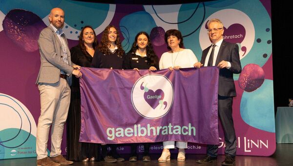 Students from Naas Community College, Naas, are presented with their Gaelbhratach (Irish flag) at Mary Immaculate College this week. Photo: Eamon Ward. Students from Naas Community College, Naas, are presented with their Gaelbhratach (Irish flag) at Mary Immaculate College this week. Photo: Eamon Ward.