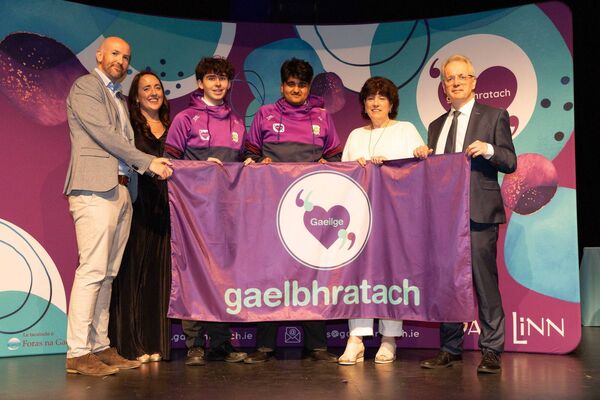 Students from Salesian College, Celbridge, are presented with their Gaelbhratach (Irish flag) at Mary Immaculate College this week. Photo: Eamon Ward. Students from Salesian College, Celbridge, are presented with their Gaelbhratach (Irish flag) at Mary Immaculate College this week. Photo: Eamon Ward.