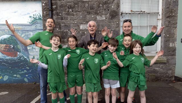 <p>Yoiung members of Sallins Celtic wonder 'Where is our Pitch' with Stephen Leonard, Sallis Celtic, Fergus Carpenter, Chairman of Sallins Community Council and Joe Lenehan, Chairman of Sallins Celtic before meeting to discuss the Kildare County Council Draft Settlement Plan for Sallins at Sallins Parish Hall. Photo: Tony Gavin</p>