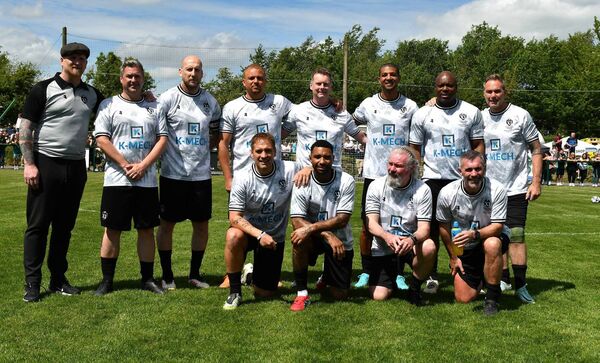 The Premier League Legends team along with their manager, Arsenal, West Ham and Celtic icon, John Hartson. The Premier League Legends team along with their manager, Arsenal, West Ham and Celtic icon, John Hartson.