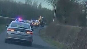 <p>Gardaí in pursuit of the stolen JCB through the by-roads </p>