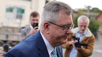 Jeffrey Donaldson arrives at court as sex offences trial enters third week