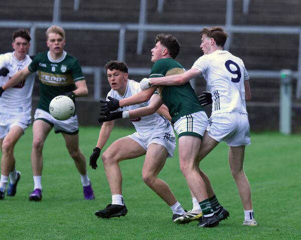 Kerry's Mikey Corridan under pressure from in possession. Kerry's Mikey Corridan under pressure from in possession.