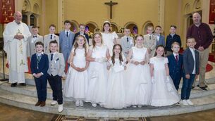 <p>Gaelscoil Átha Í céad comaoineach Photos: Aisling Hyland</p>