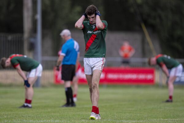 Despair for Milltown midfielder Conor Sheerin at the final whistle Photo: James Lawlor Despair for Milltown midfielder Conor Sheerin at the final whistle Photo: James Lawlor