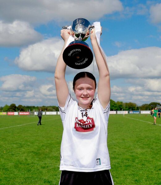 Castlemitchell and Kildare's Amy Wall lifts up the Leinster U16 trophy Photo: Karl Gormley Castlemitchell and Kildare's Amy Wall lifts up the Leinster U16 trophy Photo: Karl Gormley