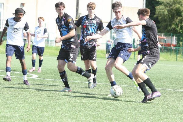 Ethan Mearns is surrounded by Derry City defenders Ethan Mearns is surrounded by Derry City defenders