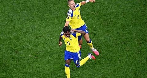 Japan and Sweden share points to book places in last 32 of World Cup