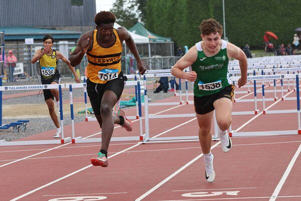 Kyle Byrne Ward (Newbridge) dips for gold in the boys u18 Hurdles. All Photos: Perri Williams. 