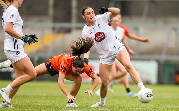 Kildare captain Laoise Lenehan makes a strong challenge to dispossess Emily Druse Photo: ©INPHO/Nick Elliott Kildare captain Laoise Lenehan makes a strong challenge to dispossess Emily Druse Photo: ©INPHO/Nick Elliott