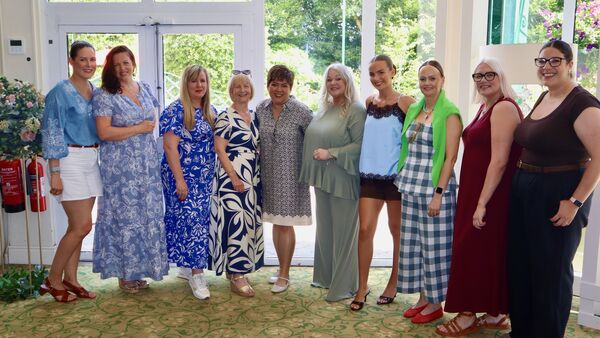 Eileen Tan, centre, with participants at her fragrance brand launch. Eileen Tan, centre, with participants at her fragrance brand launch.
