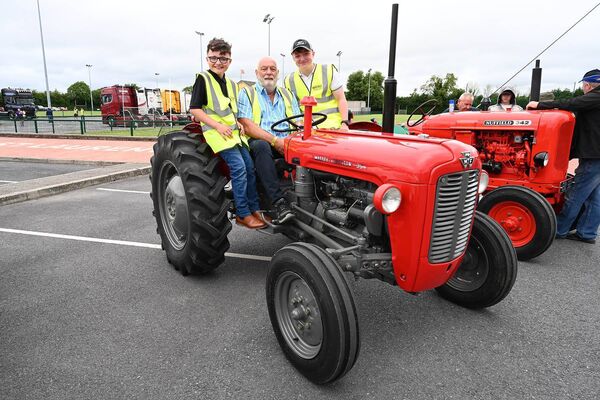 Jack and James Kelly with their Grandad Syl Kelly on Ross's tractor Jack and James Kelly with their Grandad Syl Kelly on Ross's tractor