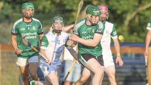 <p>Daragh McMahon fires home one of Wolfe Tones' three goals against Moorefield in The Westgrove Hotel Senior Hurling League Division 2 semi-final in Kill </p>