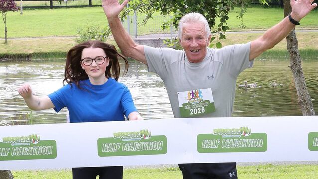 <p>Racing to the Line, former Barretstown camper Lydia Dillon pictured with Olympian Eamonn Coghlan </p>
