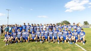 <p>Naas with the Division 1 trophy after beating Moorefield in the final</p> <p>Naas with the Division 1 trophy after beating Moorefield in the final</p>