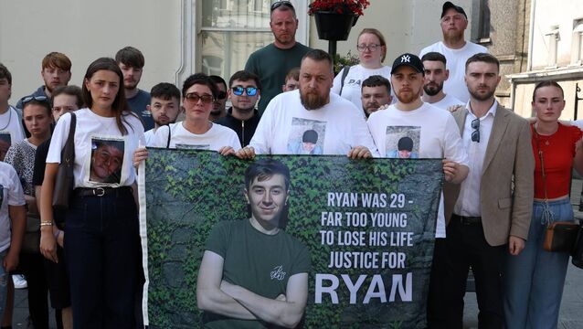 <p>The family of Ryan Weir Gibbons outside Naas courthouse after today's verdict 	Photo: Collins</p>