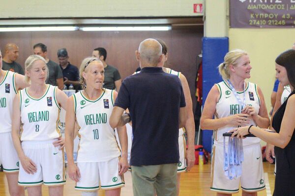 Ireland's Pam Grogan (No 10) of Naas Serpents prepares to receive her silver medal Ireland's Pam Grogan (No 10) of Naas Serpents prepares to receive her silver medal