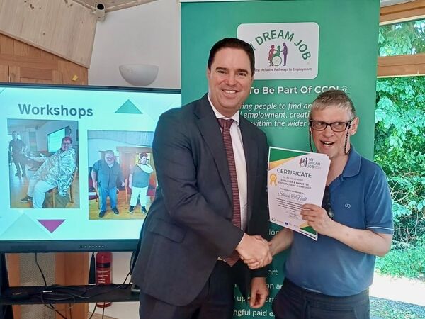Agriculture Minister Martin Heydon presenting Stuart O'Neill with his certificate