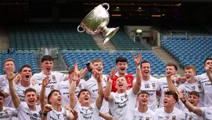 <p>Mayo, in their all-white kit, celebrate with the Sam Maguire Cup after beating Kerry in the All-Ireland final Photo: ©INPHO/Tom Maher</p>