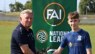 <p>Newbridge Town manager Martin Russell presents the award for Goal of the Season 2025/26 to Luke Manning. Photo: Newbridge Town.</p>
