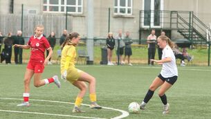 <p>Annabel Carty rounds the Sligo Rovers goalkeeper during Saturday's game </p>