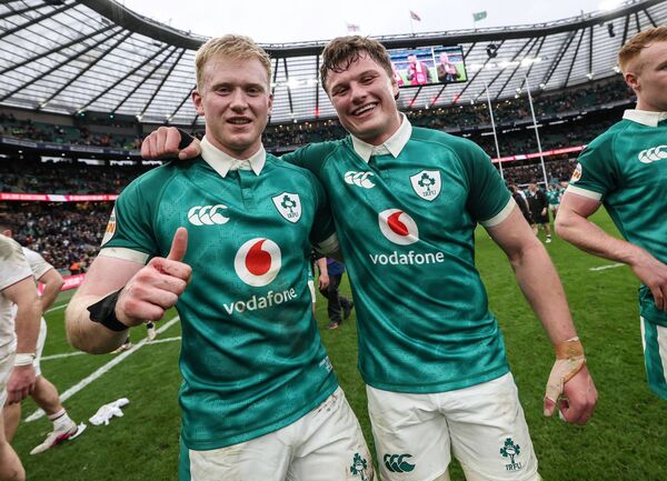 Naas's Jamie Osborne and Suncroft's Cian Prendergast celebrate after Ireland's Six Nations victory away to England. Photo: ©INPHO.