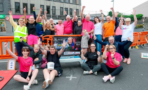 Mick Mulcahy and Maeve Aldridge alongside ARC Cancer Care volunteers , Gwendolyn Marks Family and Mic Mulcahy Fitness Team at the 12 hour fitathon at Popular Sq, Naas in aid of ARC Cancer Care in memory of Gwendolyn Marks Photo - Aishling Conway